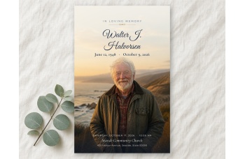 Front cover of the Quiet Shore funeral program, "In Loving Memory" and the name in navy script over a full-bleed seaside portrait.