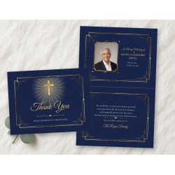 Classic Cross thank you card mockup on linen: the navy and gold folded front with a gold cross and light rays above "Thank You" in script, in front of the open card with a framed photo, "In Loving Memory of", the name and dates above a thank-you message s